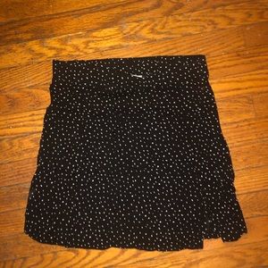 Black skirt with white polka dots